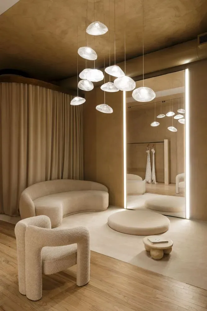 Elegant Milla Nova bridal boutique interior with private fitting rooms in SoHo, NYC